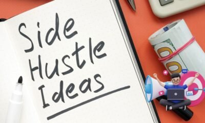 Side hustle ideas list and cash on the desk. (How to Start a Digital Marketing Side Hustle?)