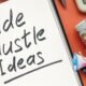 Side hustle ideas list and cash on the desk. (How to Start a Digital Marketing Side Hustle?)