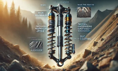 Close-up of RockShox mountain bike suspension parts under rugged conditions, showing anodized aluminum and DLC coating, highlighting durability and environmental resistance. Concept is used for Why is Nickel-Phosphor-PTFE Not Used in RockShox?